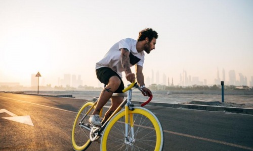 Find your perfect fit at Hudson Landing a man riding a bicycle on a road