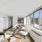 Spacious room with ample windows and natural lighting