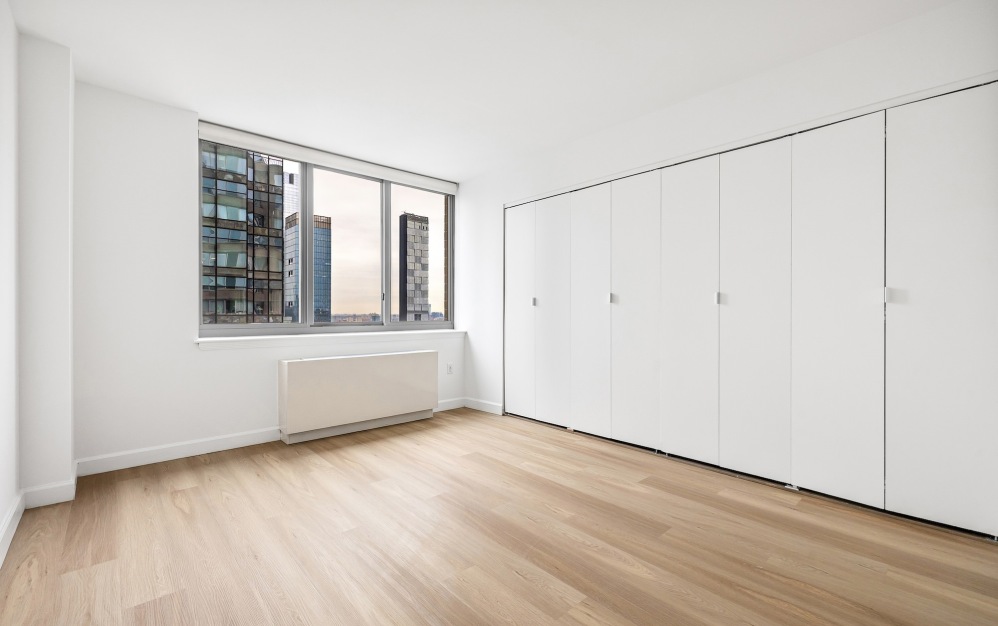 bedroom with large windows