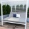 a white couch on a deck