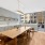 renovated lounge with catering kitchen and dining table 