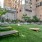 courtyard with turf and lounge seating