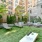 turf area with lounge seating and corn hole game