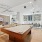 renovated resident lounge with tv seating area and billiards