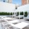 a white building with a white patio