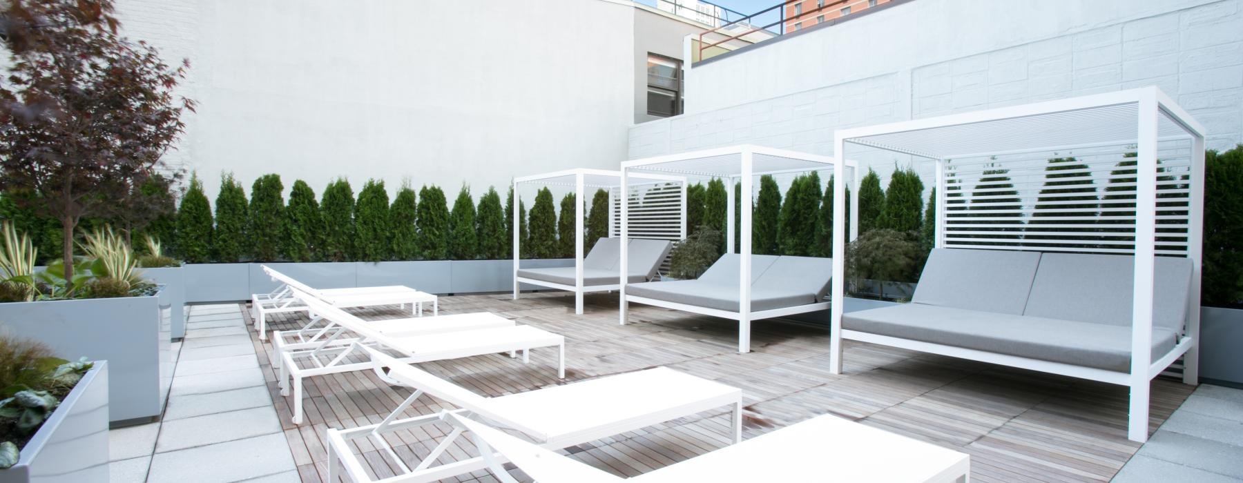 a white building with a white patio